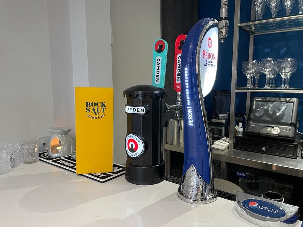 Bar seating and beer taps in the work area